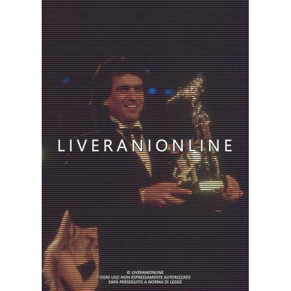 Teatro Ariston di Sanremo 40mo Festival della Canzone Italiana - 1990 nella foto Toto Cutugno con la canzone \' Gli amori \' si classifica al secondo posto ©Agenzia Aldo Liverani Sas
