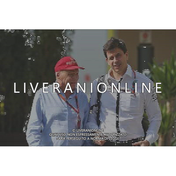 (L to R): Niki Lauda (AUT) Mercedes Non-Executive Chairman with Toto Wolff (GER) Mercedes AMG F1 Shareholder and Executive Director. 27.11.2015. Formula 1 World Championship, Rd 19, Abu Dhabi Grand Prix, Yas Marina Circuit, Abu Dhabi, Practice Day. / AGENZIA ALDO LIVERANI SAS - ITALY ONLY EDITORIAL USE ONLY - Gp F1 Abu Dhabi Prove Libere
