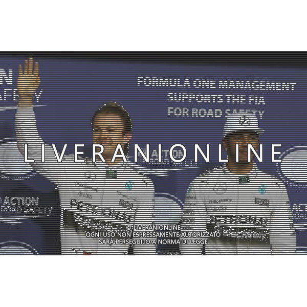 (L to R): Nico Rosberg (GER) Mercedes AMG F1 celebrates his pole position alongside second placed team mate Lewis Hamilton (GBR) Mercedes AMG F1. 28.11.2015. Formula 1 World Championship, Rd 19, Abu Dhabi Grand Prix, Yas Marina Circuit, Abu Dhabi, Qualifying Day. AG ALDO LIVERANI SAS ONLY ITALY