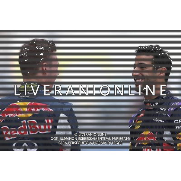 Daniel Ricciardo (AUS), Red Bull Racing and Daniil Kvyat (RUS), Red Bull Racing 29.11.2015. Formula 1 World Championship, Rd 19, Abu Dhabi Grand Prix, Yas Marina Circuit, Abu Dhabi, Race Day. AG ALDO LIVERANI SAS ONLY ITALY