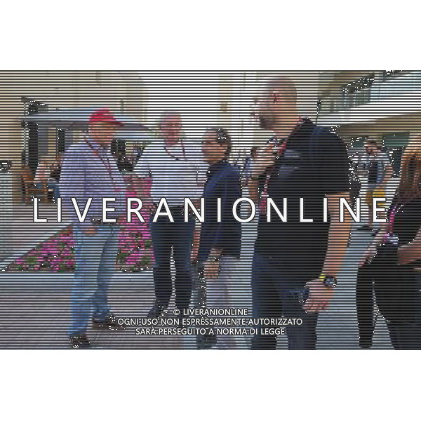 (L to R): Niki Lauda (AUT) Mercedes Non-Executive Chairman; Dr Helmut Marko (AUT) Red Bull Motorsport Consultant; Alain Prost (FRA); Gerard Lopez (FRA) Lotus F1 Team Principal. 29.11.2015. Formula 1 World Championship, Rd 19, Abu Dhabi Grand Prix, Yas Marina Circuit, Abu Dhabi, Race Day. AG ALDO LIVERANI SAS ONLY ITALY