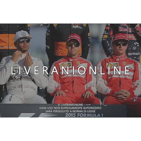 Lewis Hamilton (GBR), Mercedes AMG F1 Team, Sebastian Vettel (GER), Scuderia Ferrari and Kimi Raikkonen (FIN), Scuderia Ferrari 29.11.2015. Formula 1 World Championship, Rd 19, Abu Dhabi Grand Prix, Yas Marina Circuit, Abu Dhabi, Race Day. AG ALDO LIVERANI SAS ONLY ITALY