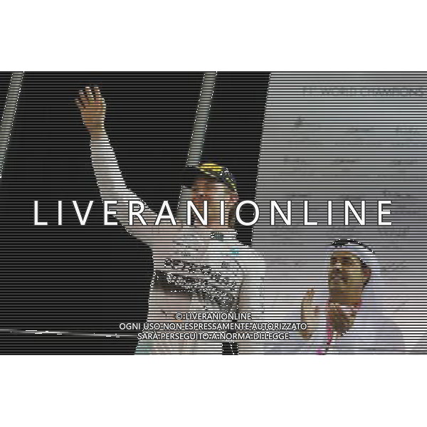 Race winner Nico Rosberg (GER) Mercedes AMG F1 celebrates on the podium. 29.11.2015. Formula 1 World Championship, Rd 19, Abu Dhabi Grand Prix, Yas Marina Circuit, Abu Dhabi, Race Day. AG ALDO LIVERANI SAS ONLY ITALY