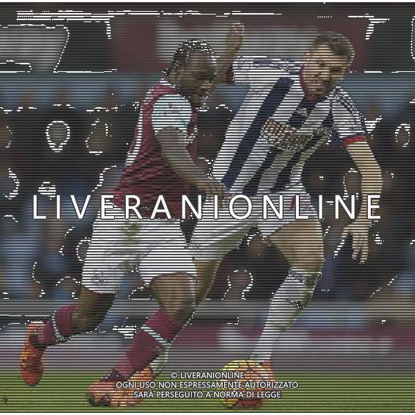 West Bromwich Albion\'s Gareth McAuley battles for possession with West Ham United\'s Victor Moses Photographer Craig Mercer/CameraSport Football - Barclays Premiership - West Ham United v West Bromwich Albion - Sunday 29th November 2015 - Boleyn Ground - London © CameraSport - 43 Linden Ave. Countesthorpe. Leicester. England. LE8 5PG - Tel: +44 (0) 116 277 4147 - admin@camerasport.com - www.camerasport.com AG ALDO LIVERANI SAS ONLY ITALY