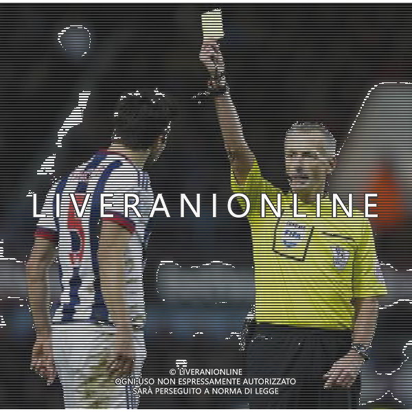 West Bromwich Albion\'s Claudio Yacob is shown a yellow card by referee Martin Atkinson Photographer Craig Mercer/CameraSport Football - Barclays Premiership - West Ham United v West Bromwich Albion - Sunday 29th November 2015 - Boleyn Ground - London © CameraSport - 43 Linden Ave. Countesthorpe. Leicester. England. LE8 5PG - Tel: +44 (0) 116 277 4147 - admin@camerasport.com - www.camerasport.com AG ALDO LIVERANI SAS ONLY ITALY