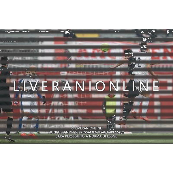 Campionato Lega Pro, Girone B, Rimini vs Santarcangelo, Derby Romagnolo del 05/12/2015, nella foto, ADORNI DAVIDE COLPISCE DI TESTA INTERCETTATO DA GIANLUCA ESPOSITO, ©CLAUDIO ZAMAGNI/AGENZIA ALDO LIVERANI S.A.S.