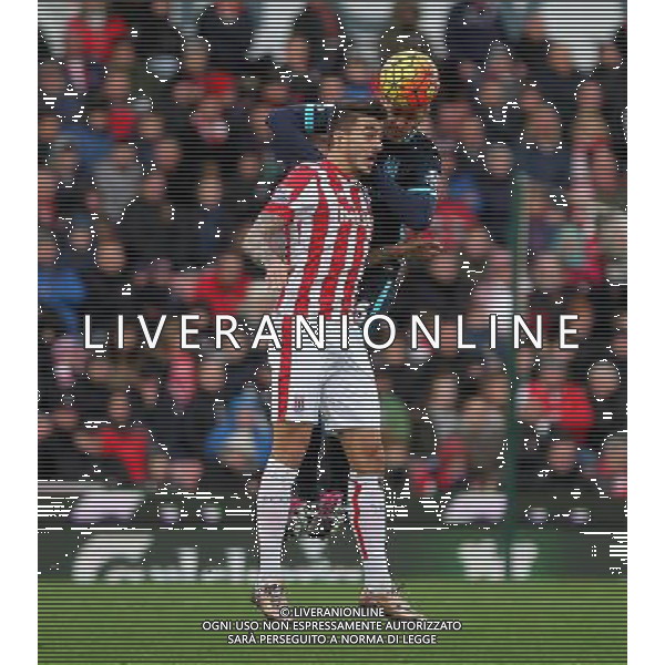 Stoke City\'s Joselu jumps with Manchester City\'s Fernando Photographer Mick Walker/CameraSport Football - Barclays Premiership - Stoke City v Manchester City - Saturday 5th December 2015 - Britannia Stadium - Stoke © CameraSport - 43 Linden Ave. Countesthorpe. Leicester. England. LE8 5PG - Tel: +44 (0) 116 277 4147 - admin@camerasport.com - www.camerasport.com AG ALDO LIVERANI SAS ONLY ITALY