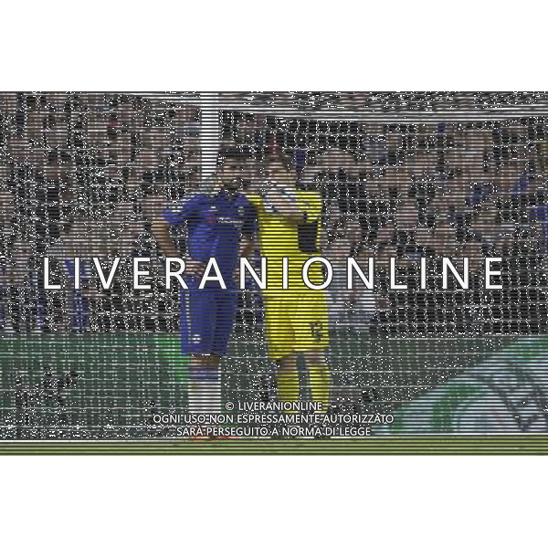 FC Porto\'s Iker Casillas chats to Chelsea\'s Diego Costa Photographer Craig Mercer/CameraSport Football - UEFA Champions League Group G - Chelsea v FC Porto - Stamford Bridge - London - © CameraSport - 43 Linden Ave. Countesthorpe. Leicester. England. LE8 5PG - Tel: +44 (0) 116 277 4147 - admin@camerasport.com - www.camerasport.com AG ALDO LIVERANI SAS ONLY ITALY