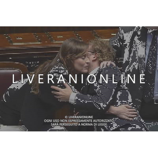 Camera dei Deputati - Mozione di sfiducia nei confronti della Ministra per le riforme costituzionali e i rapporti con il Parlamento Maria Elena Boschi Roma - 18.12.2015 - nella foto: L\'abbraccio tra Maria Elena Boschi e Luca Lotti / Ph. Corradetti - AG. Aldo Liverani/ AGENZIA ALDO LIVERANI SAS -