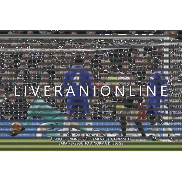 Chelsea\'s Thibaut Courtois makes a good save from Sunderland\'s John O\'Shea (#16), but Sunderland\'s Fabio Borini (not pictured) scores on the rebound Photographer Craig Mercer/CameraSport Football - Barclays Premiership - Chelsea v Sunderland - Saturday 19th December 2015 - Stamford Bridge - London Â© CameraSport - 43 Linden Ave. Countesthorpe. Leicester. England. LE8 5PG - Tel: +44 (0) 116 277 4147 - admin@camerasport.com - www.camerasport.com / AGENZIA ALDO LIVERANI SAS - ITALY ONLY EDITORIAL USE ONLY