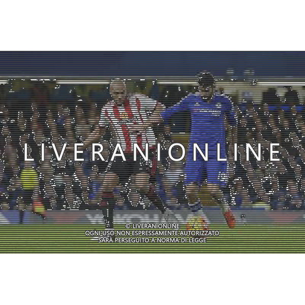 Chelsea\'s Diego Costa holds off the challenge from Sunderland\'s Younes Kaboul Photographer Craig Mercer/CameraSport Football - Barclays Premiership - Chelsea v Sunderland - Saturday 19th December 2015 - Stamford Bridge - London Â© CameraSport - 43 Linden Ave. Countesthorpe. Leicester. England. LE8 5PG - Tel: +44 (0) 116 277 4147 - admin@camerasport.com - www.camerasport.com / AGENZIA ALDO LIVERANI SAS - ITALY ONLY EDITORIAL USE ONLY