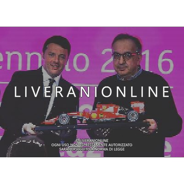 MILANO 04/01/2016 BORSA DI MILANO PRIMO GIORNO DI QUOTAZIONE AZIONI DELLA FERRARIâ€¨NELLA FOTO MATTEO RENZI CON SERGIO MARCHIONNEâ€¨Â©GAZZANIGA/AGENZIA ALDO LIVERANI SAS