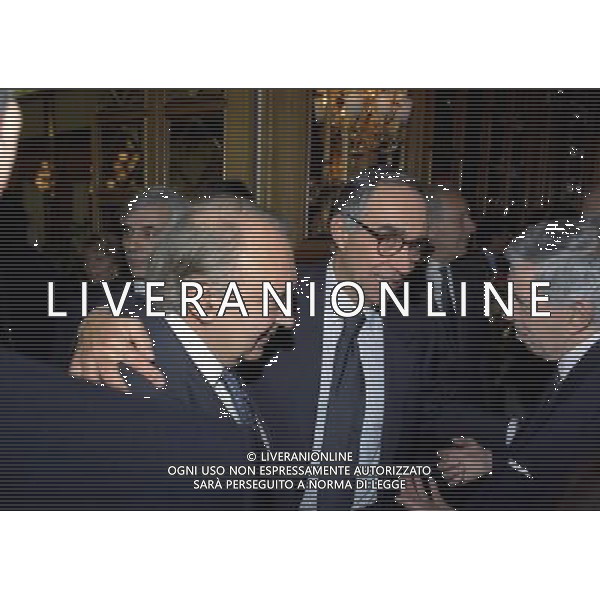 MILANO 16-12-1997 HOTEL PRINCIPE DI SAVOIA FESTA DELLA LEGA CALCIO NELLA FOTO FRANCO CARRARO CON CORRADO FERLAINO AG ALDO LIVERANI SAS