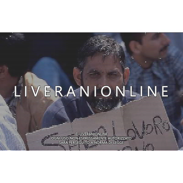 brescia emmigrati mentre manifestano foto filippo venezia-Ag aldo liverani