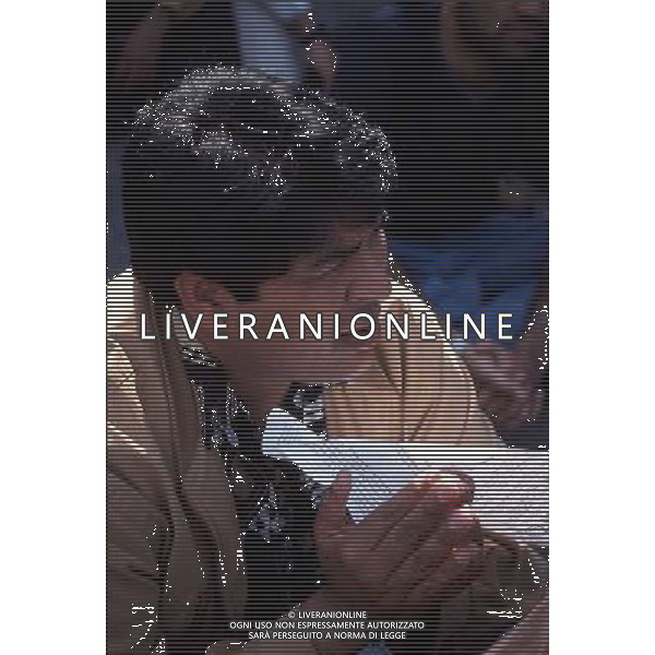 brescia emmigrati mentre prega foto filippo venezia-Ag aldo liverani