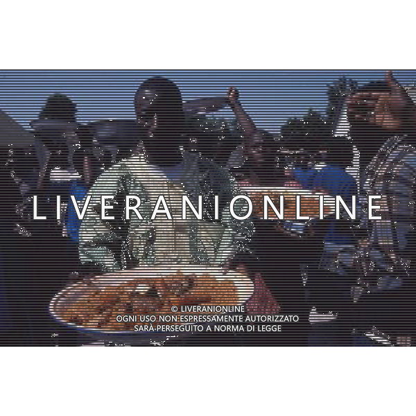 brescia festa senegalese con piatti tipici foto filippo venezia-Ag aldo liverani