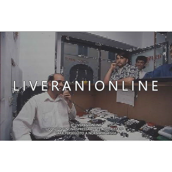brescia telephone center dove vanno gli stranieri e emmigranti a telefonare foto filippo venezia-Ag aldo liverani