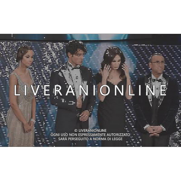 PRIMA SERATA 66mo FESTIVAL DELLA CANZONE ITALIANA DI SANREMO 09 FEBBRAIO 2016 NELLA FOTO CARLO CONTI CON MADALINA GHENEA VIRGINIA RAFFAELE (CHE IMITA SABRINA FERILLI) E GABRIEL GARKO ©GAZZANIGA / AGENZIA ALDO LIVERANI SAS 