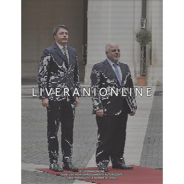 Roma - 10.02.2015 - Palazzo Chigi - Il Presidente del Consiglio dei Ministri Matteo Renzi riceve il primo ministro della Repubblica dellâ€™Iraq Haider Al-Abadi - nella foto: Matteo Renzi e Haider Al-Abadi durante gli inni nazionali / Ph. Corradetti - Ag. Aldo Liverani Sas / AGENZIA ALDO LIVERANI SAS 
