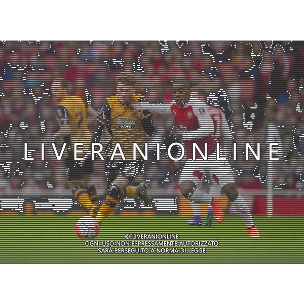 Hull City\'s Josh Tymon battles for possession with Arsenal\'s Joel Campbell Photographer Ashley Western/CameraSport Football - The FA Cup Fifth Round - Arsenal v Hull City - Saturday 20th February 2016 - Emirates Stadium - London © CameraSport - 43 Linden Ave. Countesthorpe. Leicester. England. LE8 5PG - Tel: +44 (0) 116 277 4147 - admin@camerasport.com - www.camerasport.com / AGENZIA ALDO LIVERANI SAS - EDITORIAL USE ONLY 