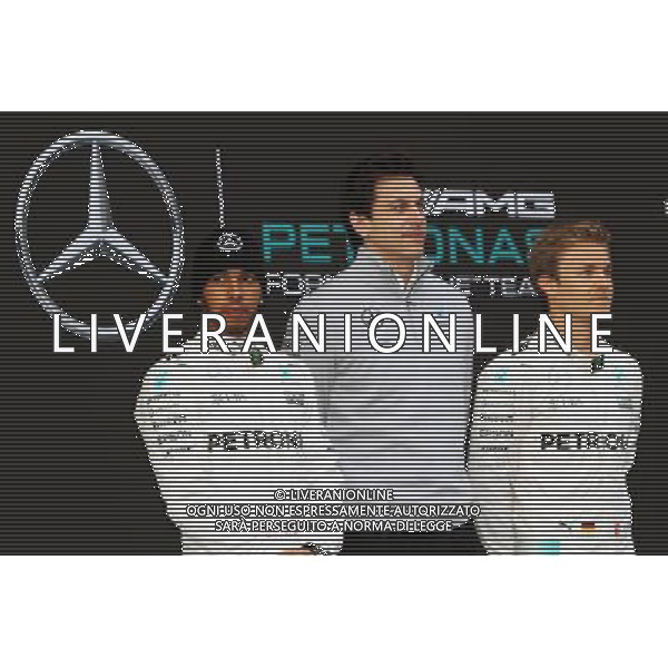 (L to R): Lewis Hamilton (GBR) Mercedes AMG F1 with Toto Wolff (GER) Mercedes AMG F1 Shareholder and Executive Director and Nico Rosberg (GER) Mercedes AMG F1. 22.02.2016. Formula One Testing, Day One, Barcelona, Spain. Monday. / AGENZIA ALDO LIVERANI SAS - ITALY ONLY EDITORIAL USE ONLY