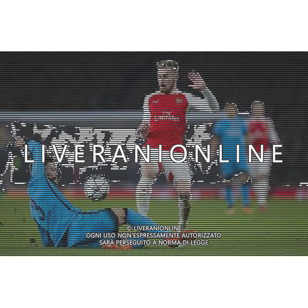 Arsenal\'s Aaron Ramsey is tackled by Barcelona\'s Gerard Pique Photographer Craig Mercer/CameraSport Football - UEFA Champions League Round of 16 - Arsenal v Barcelona - Tuesday 23rd February 2016 - Emirates Stadium - London © CameraSport - 43 Linden Ave. Countesthorpe. Leicester. England. LE8 5PG - Tel: +44 (0) 116 277 4147 - admin@camerasport.com - www.camerasport.com AG ALDO LIVERANI SAS ONLY ITALY