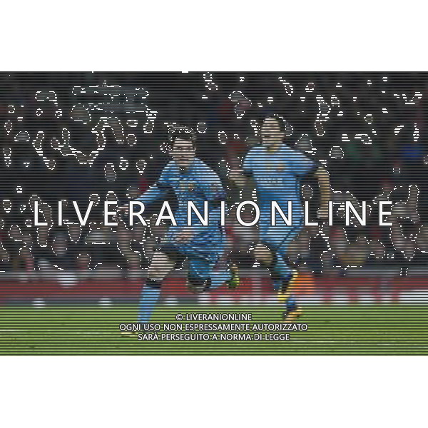GOAL CELEBRATION - Barcelona\'s Lionel Messi celebrates scoring his sides second goal from the penalty spot Photographer Craig Mercer/CameraSport Football - UEFA Champions League Round of 16 - Arsenal v Barcelona - Tuesday 23rd February 2016 - Emirates Stadium - London © CameraSport - 43 Linden Ave. Countesthorpe. Leicester. England. LE8 5PG - Tel: +44 (0) 116 277 4147 - admin@camerasport.com - www.camerasport.com AG ALDO LIVERANI SAS ONLY ITALY