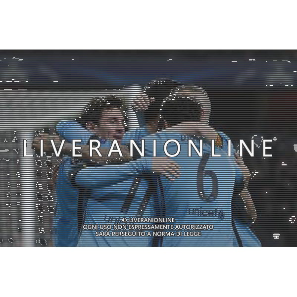 GOAL CELEBRATION - Barcelona\'s Lionel Messi (left) celebrates scoring the opening goal with team mates Photographer Craig Mercer/CameraSport Football - UEFA Champions League Round of 16 - Arsenal v Barcelona - Tuesday 23rd February 2016 - Emirates Stadium - London © CameraSport - 43 Linden Ave. Countesthorpe. Leicester. England. LE8 5PG - Tel: +44 (0) 116 277 4147 - admin@camerasport.com - www.camerasport.com AG ALDO LIVERANI SAS ONLY ITALY