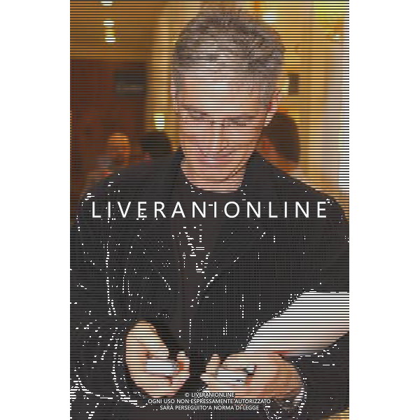 MILANO 20/3/03 P.ZZA DELLA REPUBBLICA, GRAND HOTEL DUCA D\' AOSTA PRESENTAZIONE DELLA NUOVA GILERA 125CC NELLA FOTO IL GIORNALISTA TELEVISIVO DI RAI 3 GIOVANNI FOSSATI FOTO MARIO ROMANO/AG.ALDO LIVERANI 