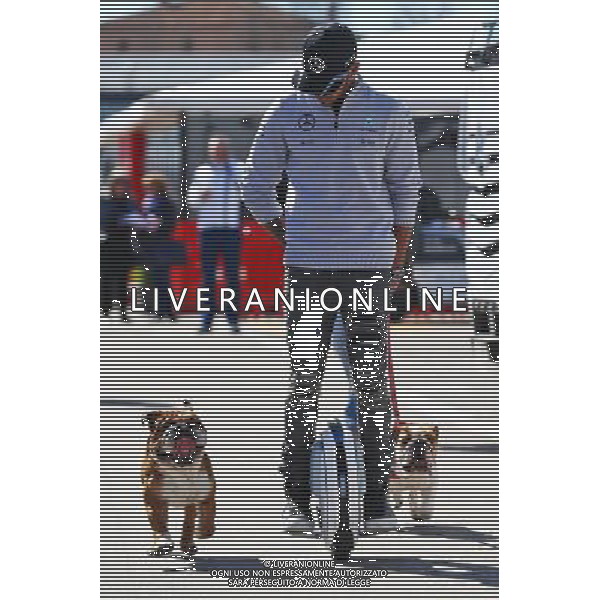 Lewis Hamilton (GBR) Mercedes AMG F1 on a hoverboard in the paddock with his dogs Roscoe and Coco. 01.03.2016. Formula One Testing, Day One, Barcelona, Spain. Tuesday. / AGENZIA ALDO LIVERANI SAS - ITALY ONLY EDITORIAL USE ONLY