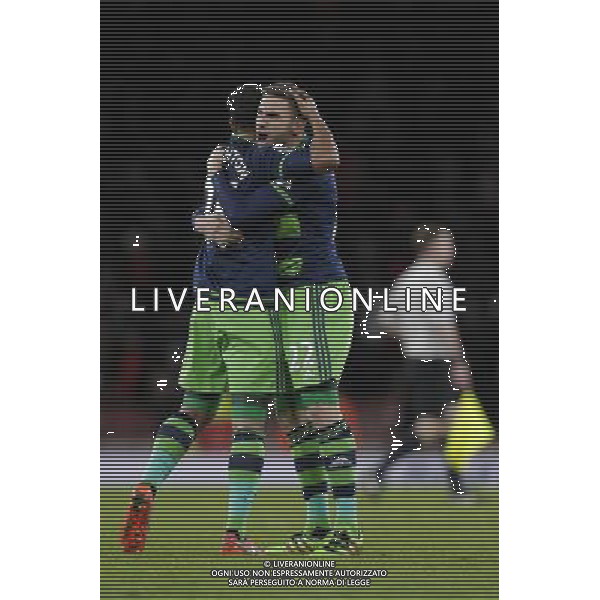 Swansea City\'s Angel Rangel (right) and Kyle Naughton celebrate their side\'s 1-2 victory at full time Photographer Craig Mercer/CameraSport Football - Barclays Premiership - Arsenal v Swansea City - Wednesday 2nd March 2016 - Emirates Stadium - London © CameraSport - 43 Linden Ave. Countesthorpe. Leicester. England. LE8 5PG - Tel: +44 (0) 116 277 4147 - admin@camerasport.com - www.camerasport.com AG ALDO LIVERANI SAS ONLY ITALY