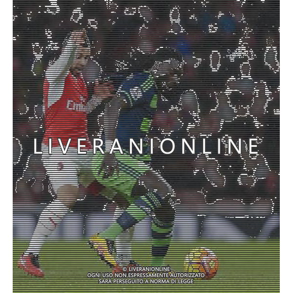 Swansea City\'s Bafetibis Gomis holds off the challenge from Arsenal\'s Francis Coquelin Photographer Craig Mercer/CameraSport Football - Barclays Premiership - Arsenal v Swansea City - Wednesday 2nd March 2016 - Emirates Stadium - London © CameraSport - 43 Linden Ave. Countesthorpe. Leicester. England. LE8 5PG - Tel: +44 (0) 116 277 4147 - admin@camerasport.com - www.camerasport.com AG ALDO LIVERANI SAS ONLY ITALY