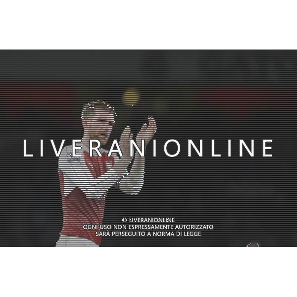 Arsenal\'s Per Mertesacker applauds the home fans at full time Photographer Craig Mercer/CameraSport Football - Barclays Premiership - Arsenal v Swansea City - Wednesday 2nd March 2016 - Emirates Stadium - London © CameraSport - 43 Linden Ave. Countesthorpe. Leicester. England. LE8 5PG - Tel: +44 (0) 116 277 4147 - admin@camerasport.com - www.camerasport.com AG ALDO LIVERANI SAS ONLY ITALY