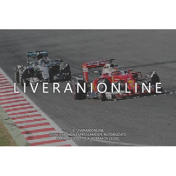 Kimi Raikkonen (FIN) Ferrari SF16-H leads Nico Rosberg (GER) Mercedes AMG F1 W07 Hybrid. 03.03.2016. Formula One Testing, Day Three, Barcelona, Spain. Thursday. AG ALDO LIVERANI SAS ONLY ITALY