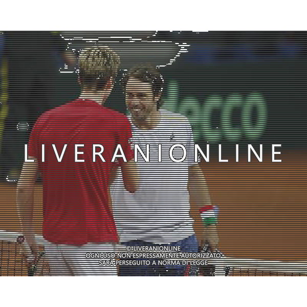 Coppa Davis, Italia vs Svizzera, primo turno del gruppo mondiale Davis Cup BNP Paribas, 06/03/2016, nella foto: PAOLO LORENZI E BALLIER, SI STRINGONO LA MANO ALLA FINE DEL MATCH, ©Claudio Zamagni/Agenzia Aldo Liverani s.a.s.