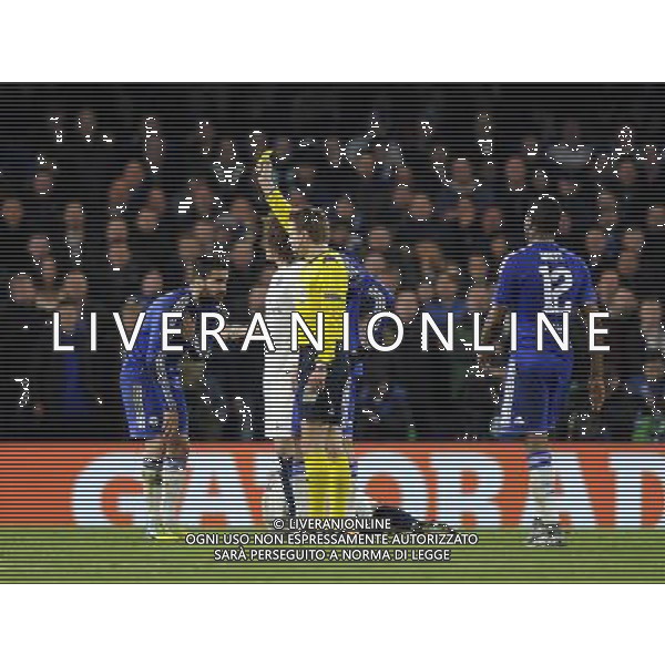 Chelsea\'s Cesc Fabregas is shown a yellow card by Referee Felix Brych (GER) Photographer Ashley Western/CameraSport Football - UEFA Champions League Round of 16 Second Leg - Chelsea v Paris Saint-Germain - Wednesday 9th March 2016 - Stamford Bridge - London © CameraSport - 43 Linden Ave. Countesthorpe. Leicester. England. LE8 5PG - Tel: +44 (0) 116 277 4147 - admin@camerasport.com - www.camerasport.com AG ALDO LIVERANI SAS ONLY ITALY