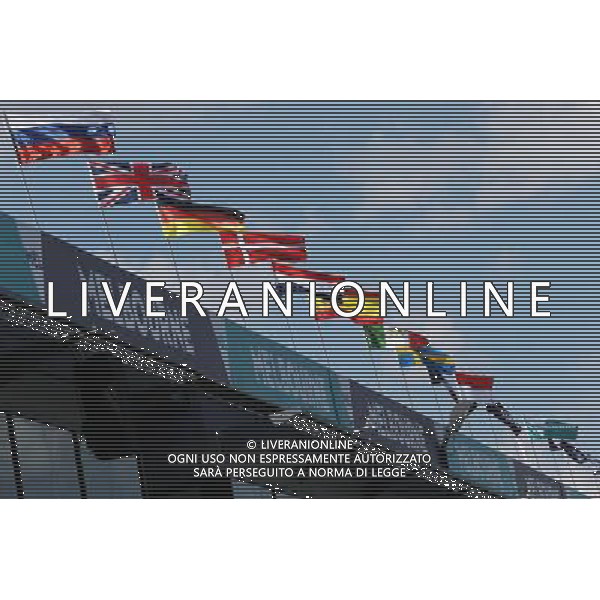 Flags over the pit lane. 16.03.2016. Formula 1 World Championship, Rd 1, Australian Grand Prix, Albert Park, Melbourne, Australia, Preparation Day. AG ALDO LIVERANI SAS ONLY ITALY