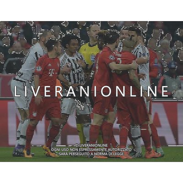 UEFA Champions League 2015/2016 Ottavi di Finale Ritorno Monaco di Baviera (Germania) - 16.03.2016 Bayern Monaco-Juventus Nella Foto:scontro tra arturo vidal e juan cuadrado /Ph.Vitez-Ag. Aldo Liverani