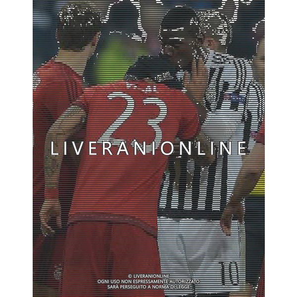 UEFA Champions League 2015/2016 Ottavi di Finale Ritorno Monaco di Baviera (Germania) - 16.03.2016 Bayern Monaco-Juventus Nella Foto: paul pogba cerca di calmare arturo vidal /Ph.Vitez-Ag. Aldo Liverani