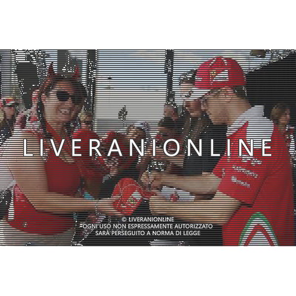 Sebastian Vettel (GER) Ferrari signs autographs for the fans. 17.03.2016. Formula 1 World Championship, Rd 1, Australian Grand Prix, Albert Park, Melbourne, Australia, Preparation Day. / AGENZIA ALDO LIVERANI SAS - ITALY ONLY EDITORIAL USE ONLY