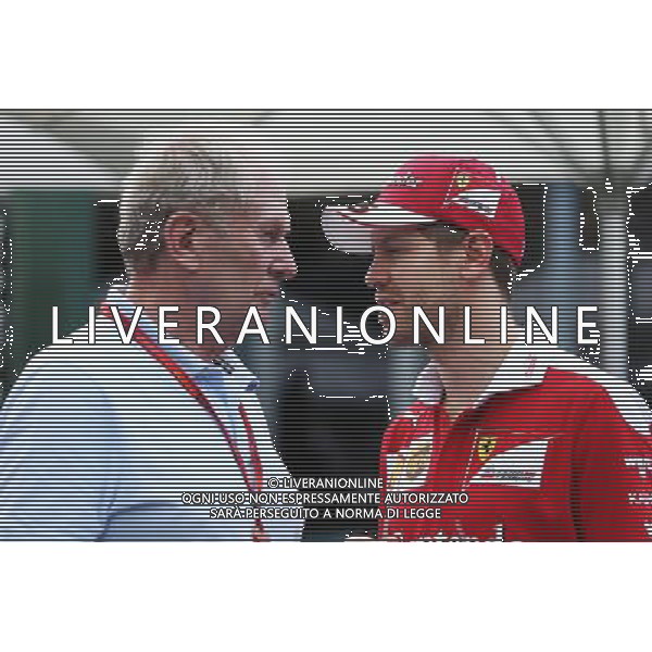 (L to R): Dr Helmut Marko (AUT) Red Bull Motorsport Consultant with Sebastian Vettel (GER) Ferrari. 17.03.2016. Formula 1 World Championship, Rd 1, Australian Grand Prix, Albert Park, Melbourne, Australia, Preparation Day. / AGENZIA ALDO LIVERANI SAS - ITALY ONLY EDITORIAL USE ONLY