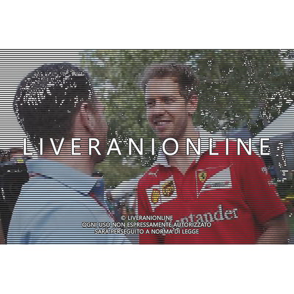 (L to R): Christian Horner (GBR) Red Bull Racing Team Principal with Sebastian Vettel (GER) Ferrari. 17.03.2016. Formula 1 World Championship, Rd 1, Australian Grand Prix, Albert Park, Melbourne, Australia, Preparation Day. AG ALDO LIVERANI SAS ONLY ITALY