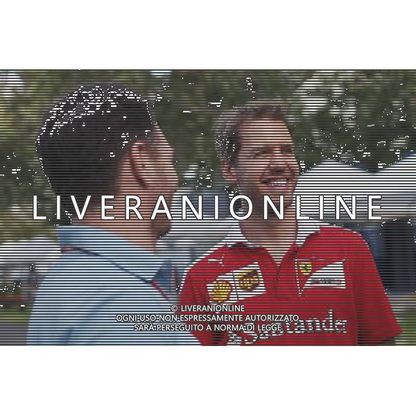 (L to R): Christian Horner (GBR) Red Bull Racing Team Principal with Sebastian Vettel (GER) Ferrari. 17.03.2016. Formula 1 World Championship, Rd 1, Australian Grand Prix, Albert Park, Melbourne, Australia, Preparation Day. AG ALDO LIVERANI SAS ONLY ITALY