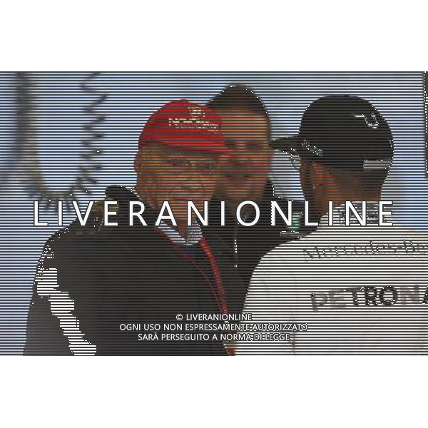 (L to R): Niki Lauda (AUT) Mercedes Non-Executive Chairman with Lewis Hamilton (GBR) Mercedes AMG F1. 18.03.2016. Formula 1 World Championship, Rd 1, Australian Grand Prix, Albert Park, Melbourne, Australia, Practice Day. - www.xpbimages.com, EMail: requests@xpbimages.com - copy of publication required for printed pictures. Every used picture is fee-liable. © Copyright: Batchelor / XPB Images /Agenzia Aldo Liverani s.a.s./ONLY ITALY-EDITORIAL USE ONLY
