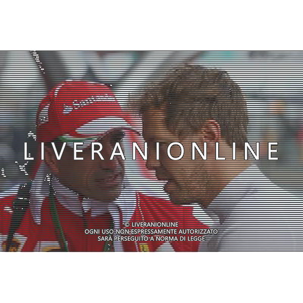 (L to R): Marc Gene (ESP) Ferrari Test Driver with Sebastian Vettel (GER) Ferrari. 18.03.2016. Formula 1 World Championship, Rd 1, Australian Grand Prix, Albert Park, Melbourne, Australia, Practice Day. - www.xpbimages.com, EMail: requests@xpbimages.com - copy of publication required for printed pictures. Every used picture is fee-liable. © Copyright: Batchelor / XPB Images /Agenzia Aldo Liverani s.a.s./ONLY ITALY-EDITORIAL USE ONLY