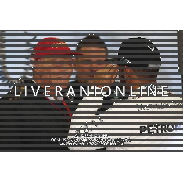 (L to R): Niki Lauda (AUT) Mercedes Non-Executive Chairman with Lewis Hamilton (GBR) Mercedes AMG F1. 18.03.2016. Formula 1 World Championship, Rd 1, Australian Grand Prix, Albert Park, Melbourne, Australia, Practice Day. - www.xpbimages.com, EMail: requests@xpbimages.com - copy of publication required for printed pictures. Every used picture is fee-liable. © Copyright: Batchelor / XPB Images /Agenzia Aldo Liverani s.a.s./ONLY ITALY-EDITORIAL USE ONLY