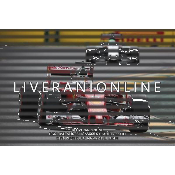 Sebastian Vettel (GER), Scuderia Ferrari 19.03.2016. Formula 1 World Championship, Rd 1, Australian Grand Prix, Albert Park, Melbourne, Australia, Qualifying Day. - www.xpbimages.com, EMail: requests@xpbimages.com - copy of publication required for printed pictures. Every used picture is fee-liable. © Copyright: Charniaux / XPB Images /Agenzia Aldo Liverani s.a.s./ONLY ITALY-EDITORIAL USE ONLY