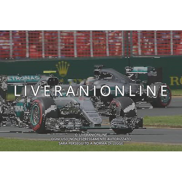 Nico Rosberg (GER) Mercedes AMG F1 W07 Hybrid leads team mate Lewis Hamilton (GBR) Mercedes AMG F1 W07 Hybrid. 19.03.2016. Formula 1 World Championship, Rd 1, Australian Grand Prix, Albert Park, Melbourne, Australia, Qualifying Day. - www.xpbimages.com, EMail: requests@xpbimages.com - copy of publication required for printed pictures. Every used picture is fee-liable. © Copyright: Photo4 / XPB Images /Agenzia Aldo Liverani s.a.s./ONLY ITALY-EDITORIAL USE ONLY