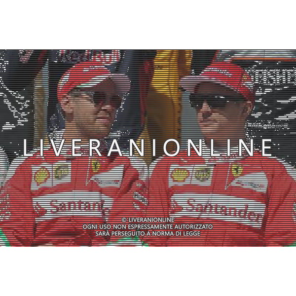 Sebastian Vettel (GER), Scuderia Ferrari and Kimi Raikkonen (FIN), Scuderia Ferrari 20.03.2016. Formula 1 World Championship, Rd 1, Australian Grand Prix, Albert Park, Melbourne, Australia, Race Day. - www.xpbimages.com, EMail: requests@xpbimages.com - copy of publication required for printed pictures. Every used picture is fee-liable. Â© Copyright: Charniaux / XPB Images/Agenzia Aldo Liverani s.a.s./ONLY ITALY/EDITORIAL USE ONLY