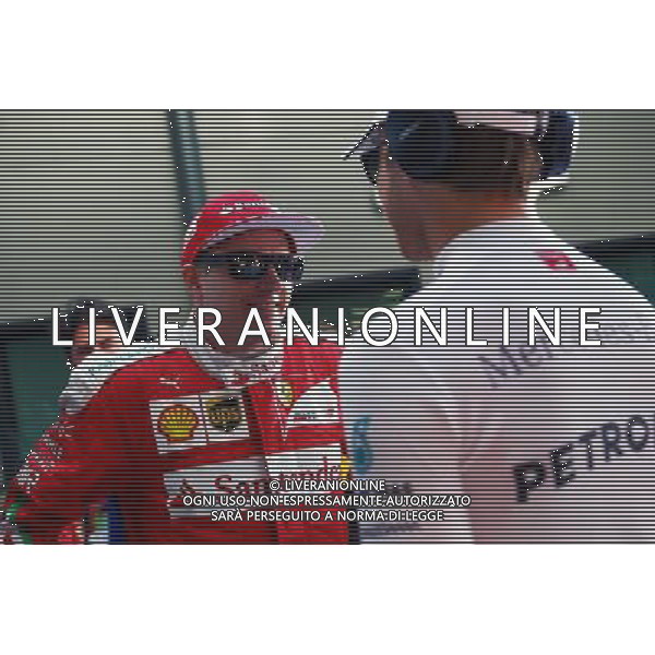(L to R): Kimi Raikkonen (FIN) Ferrari with Nico Rosberg (GER) Mercedes AMG F1. 20.03.2016. Formula 1 World Championship, Rd 1, Australian Grand Prix, Albert Park, Melbourne, Australia, Race Day. - www.xpbimages.com, EMail: requests@xpbimages.com - copy of publication required for printed pictures. Every used picture is fee-liable. Â© Copyright: Batchelor / XPB Images/Agenzia Aldo Liverani s.a.s./ONLY ITALY/EDITORIAL USE ONLY